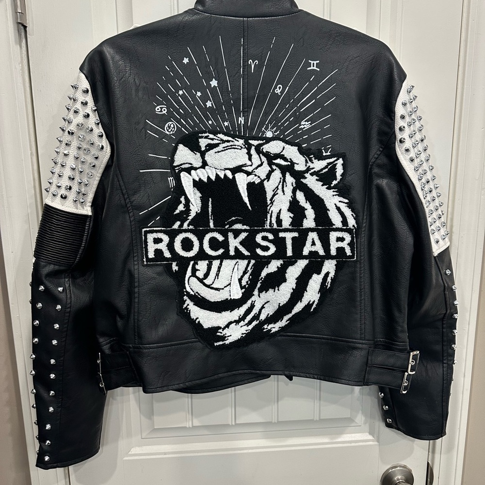 Be a rockstar in this Black and White Studded Leather Biker Jacket